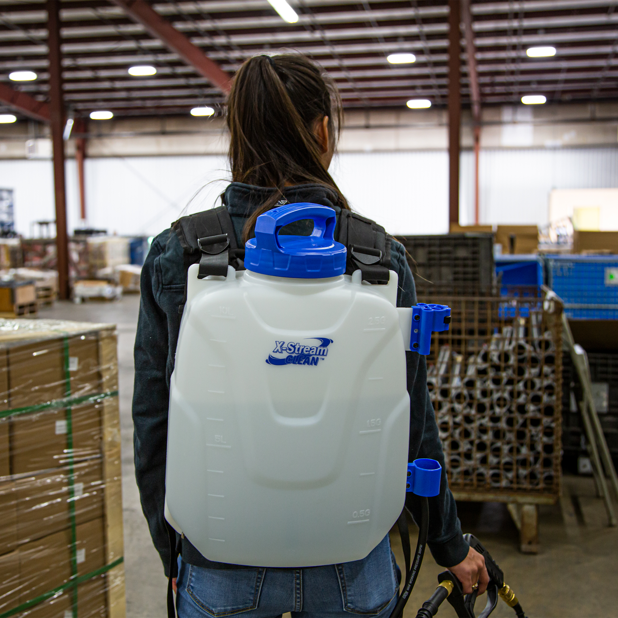 X-Stream Clean 2.5-Gallon Cleaning and  Sanitation Backpack Sprayer on in a warehouse 